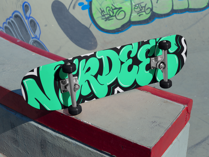 Nerdee's Skate Shop "Nerdee Green Graffiti Logo Zoom" Skateboard Deck