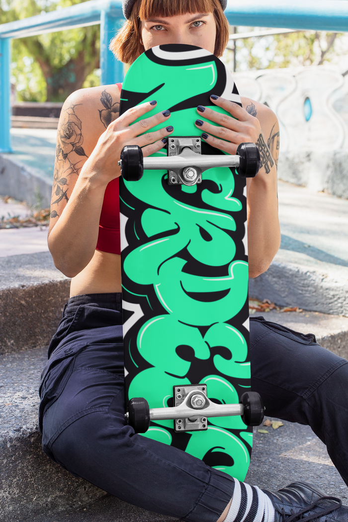 Nerdee's Skate Shop "Nerdee Green Graffiti Logo Zoom" Skateboard Deck